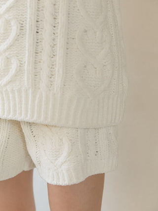 Heart Aran Pullover Sweater with cable-knit pattern and heart motifs, showcasing cozy elegance.