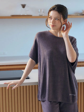 Model wearing Smoothie Lite Pullover Top from Gelato Pique USA, showcasing premium loungewear and sleepwear in a home setting.