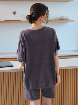 Woman wearing Smoothie Lite Pullover Top, made from premium Gelato Pique USA material, ideal for loungewear and sleepwear.