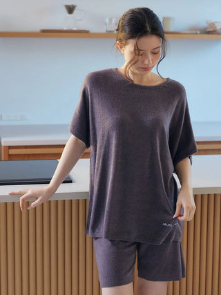Woman wearing Smoothie Lite Pullover Tops by Gelato Pique USA, premium loungewear and sleepwear, showcasing soft knit material.