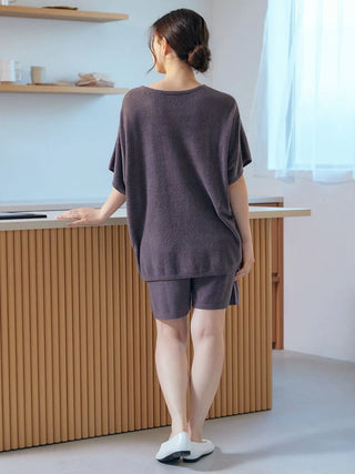 Woman wearing Gelato Pique USA Smoothie Lite pullover top, premium loungewear and sleepwear, showcasing loose fit and soft material.