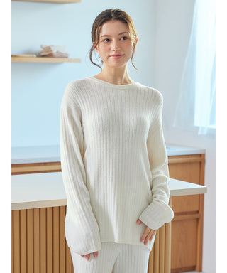 Woman wearing a white Gelato Pique USA Thermal Smoothie Pullover Sweater, premium loungewear and sleepwear with ribbed texture.