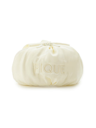 Marshmallow Motif Round Pouch with embroidered 'PIQUE' logo, soft spring color, and puffy shape ideal for cosmetics and everyday use.