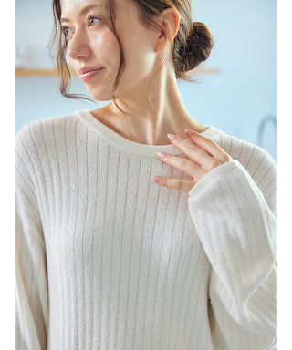 Woman wearing beige Gelato Pique USA Thermal Smoothie Pullover Sweater, premium loungewear and sleepwear with ribbed texture.