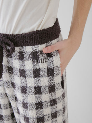 Close up view of a man in [Chocolate & Framboise] [MENS] Baby Moco Gingham Check Pants