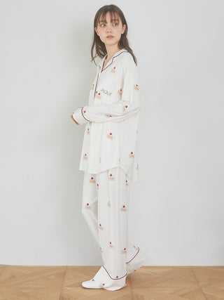 Model wearing Cake Motif Pants with sweet shortcake print and piping details, made from silky rayon fabric for comfort.