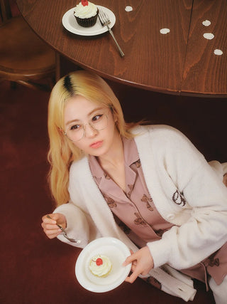 HUH YUNJIN of LE SSERAFIM wearing ivory Baby Moco Bear Jacquard Cardigan